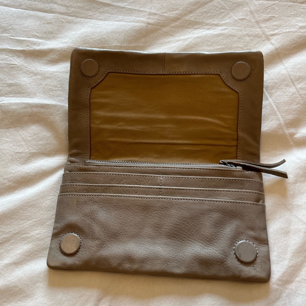 Beige leather clutch wallet